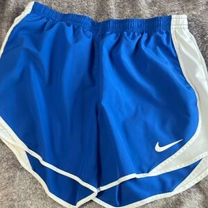 Blue and white Nike shorts women’s small innerliner cut out